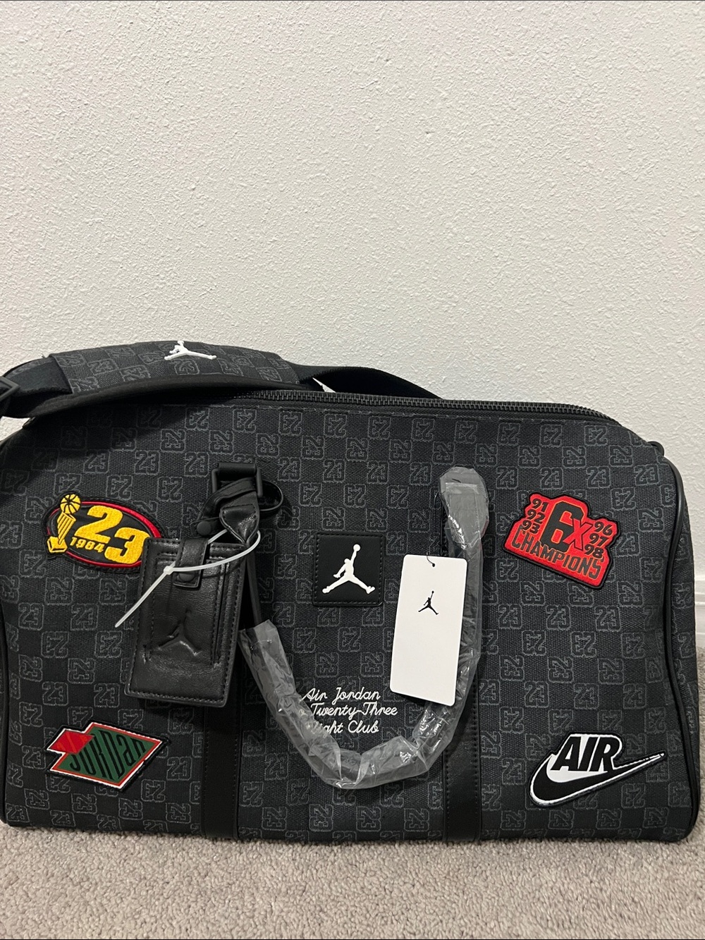 Jordan Black Duffel with Colorful Sports Patch Details